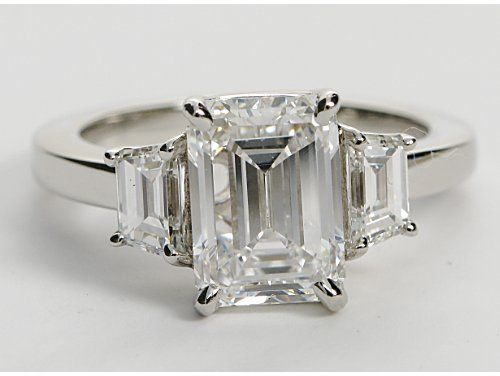 Kim Kardashian step cut trapezoid setting with emerald cut diamond from blue nile