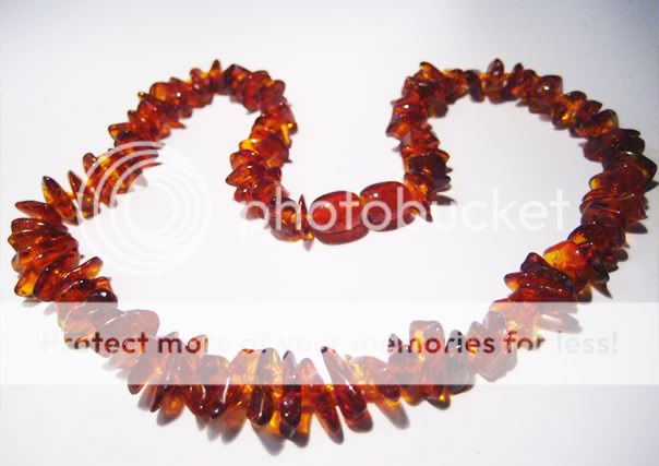 38 inch 34 cm long 22 gr total weight amber stone range is 9 x 6 6 x 5 